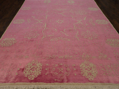 Close-up of carved wool-silk pile, beige and pink rug