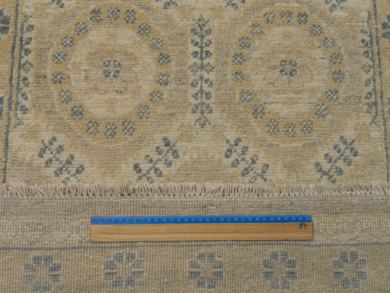 Blue and beige Oushak runner in hallway setting