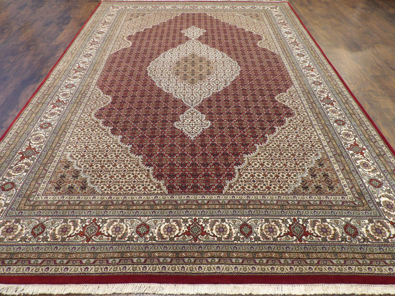 Fine Persian Mahi Tabriz rug corner detail