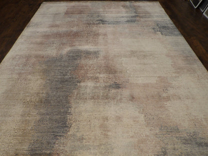Close-up of wool-silk pile, gray and pink rug