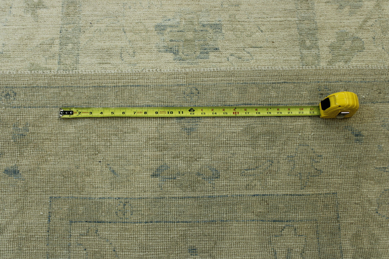 Oushak Chobi hand-knotted wool rug in Beige & Pink, full view