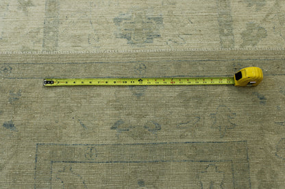 Oushak Chobi hand-knotted wool rug in Beige & Pink, full view