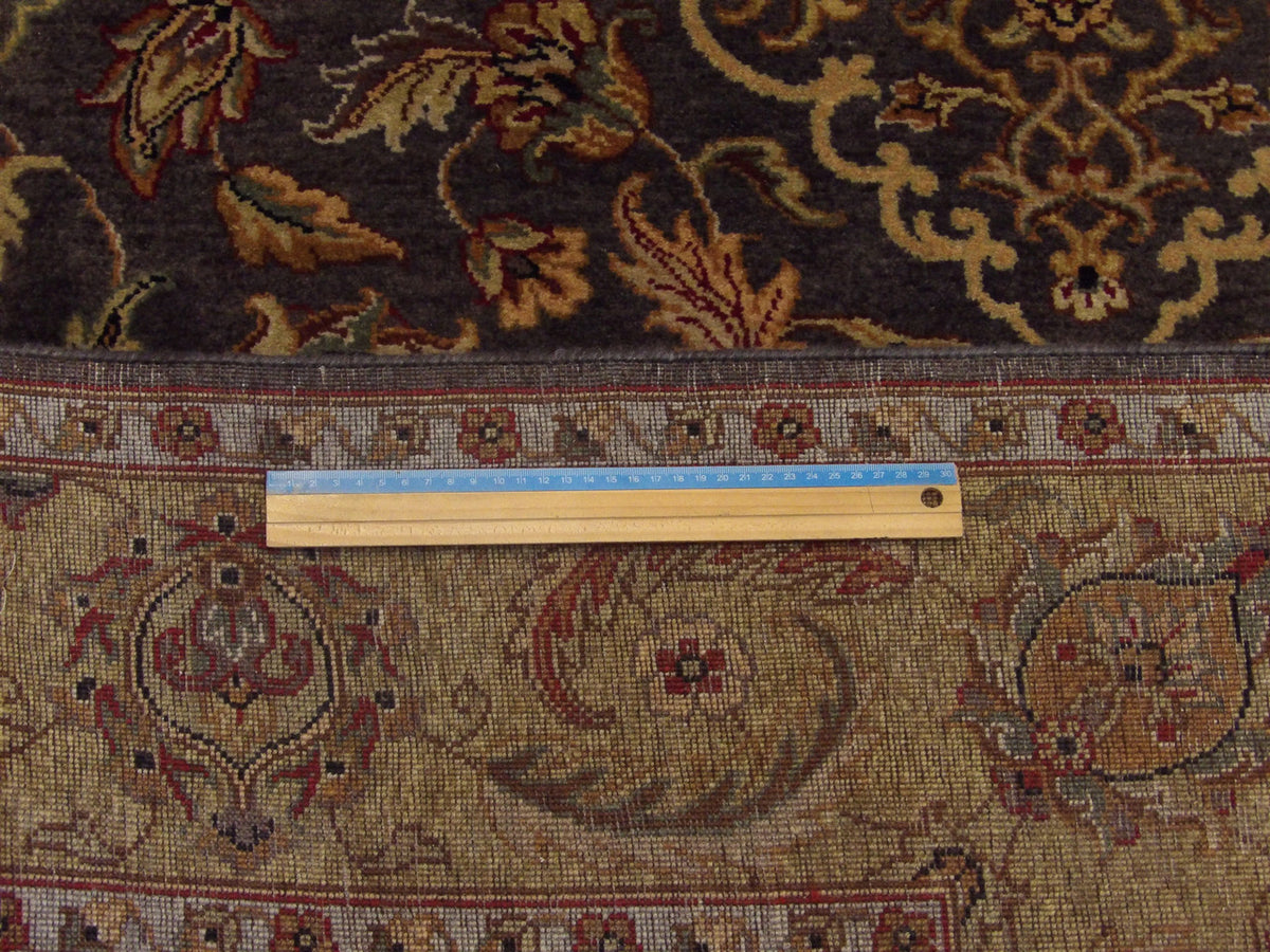 Gold and purple Ziegler rug in room setting