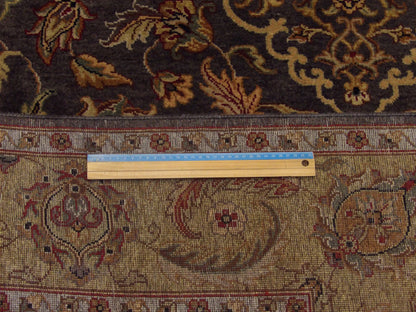 Gold and purple Ziegler rug in room setting