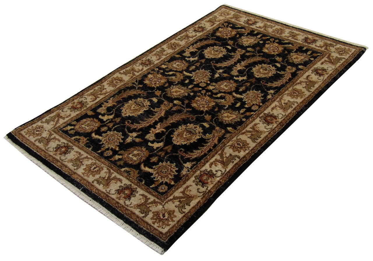 Close-up of high-twist wool pile, black and beige rug