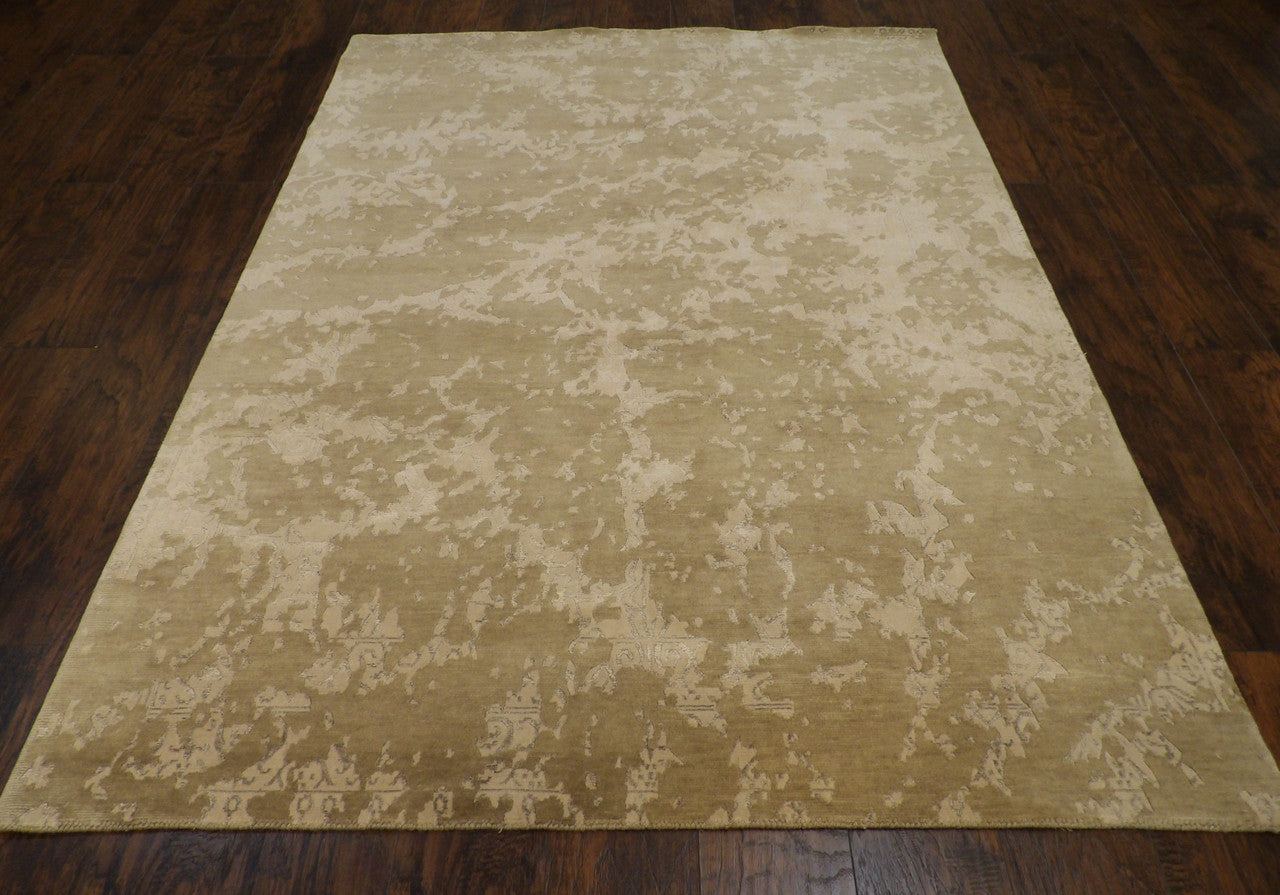 Close-up of wool-silk sheen on broken damask rug