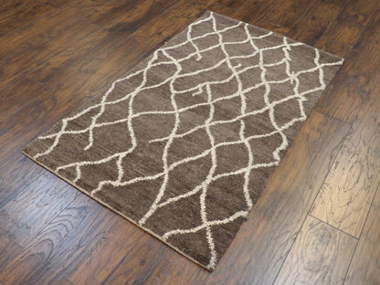 Moroccan pattern detail, brown rug
