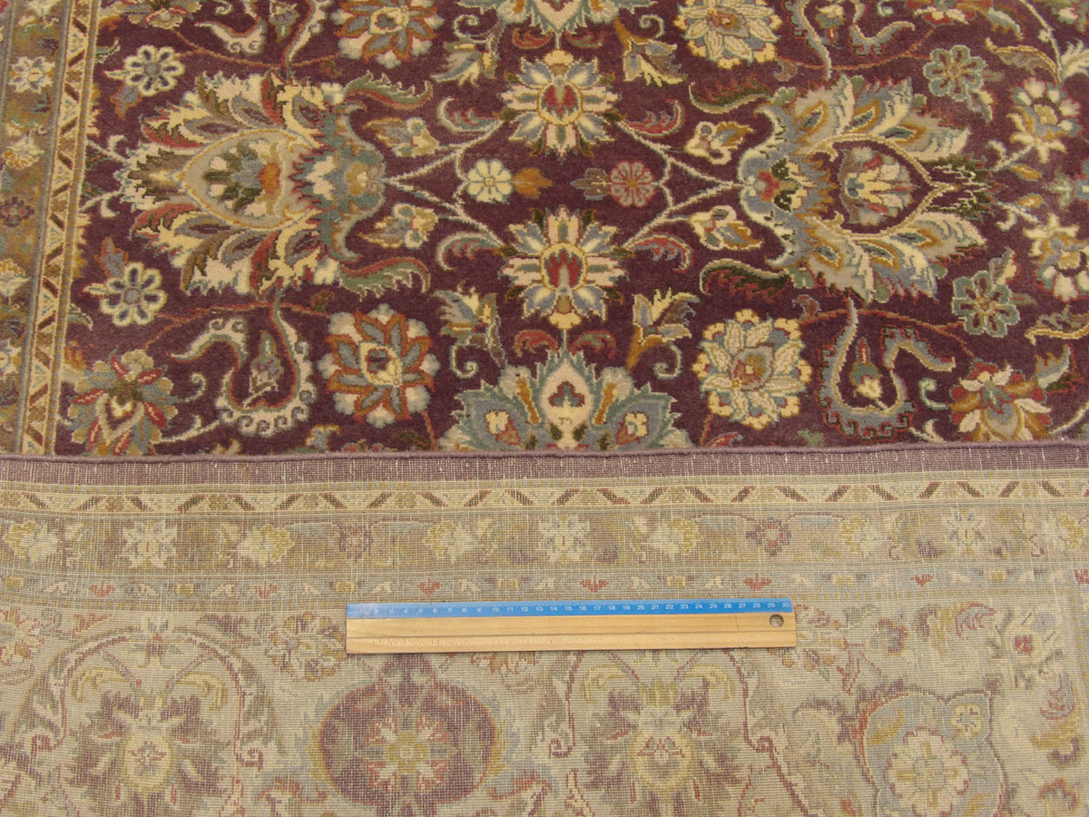 Gray & Red Fine Pak Persian Kashan rug in room setting
