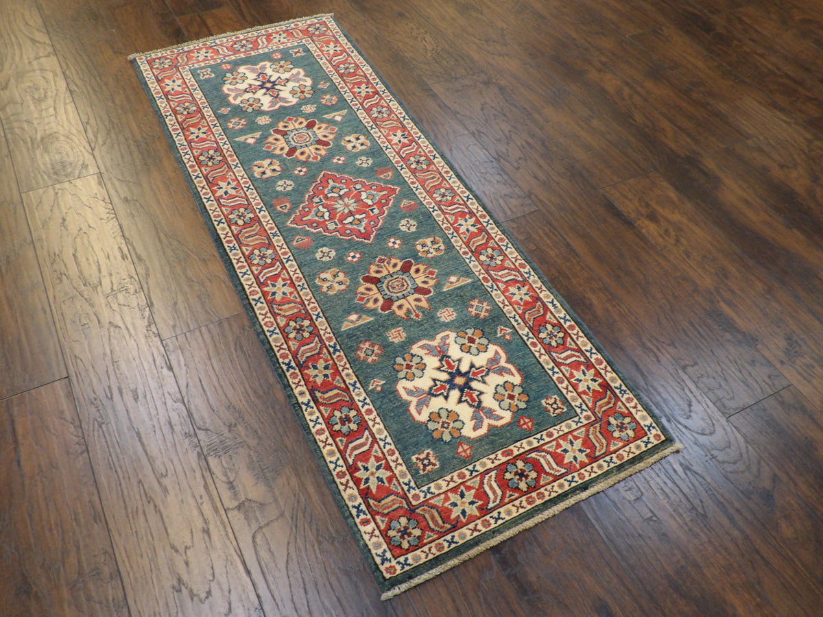 Tribal Kazak rug corner detail