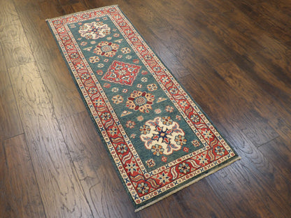Tribal Kazak rug corner detail