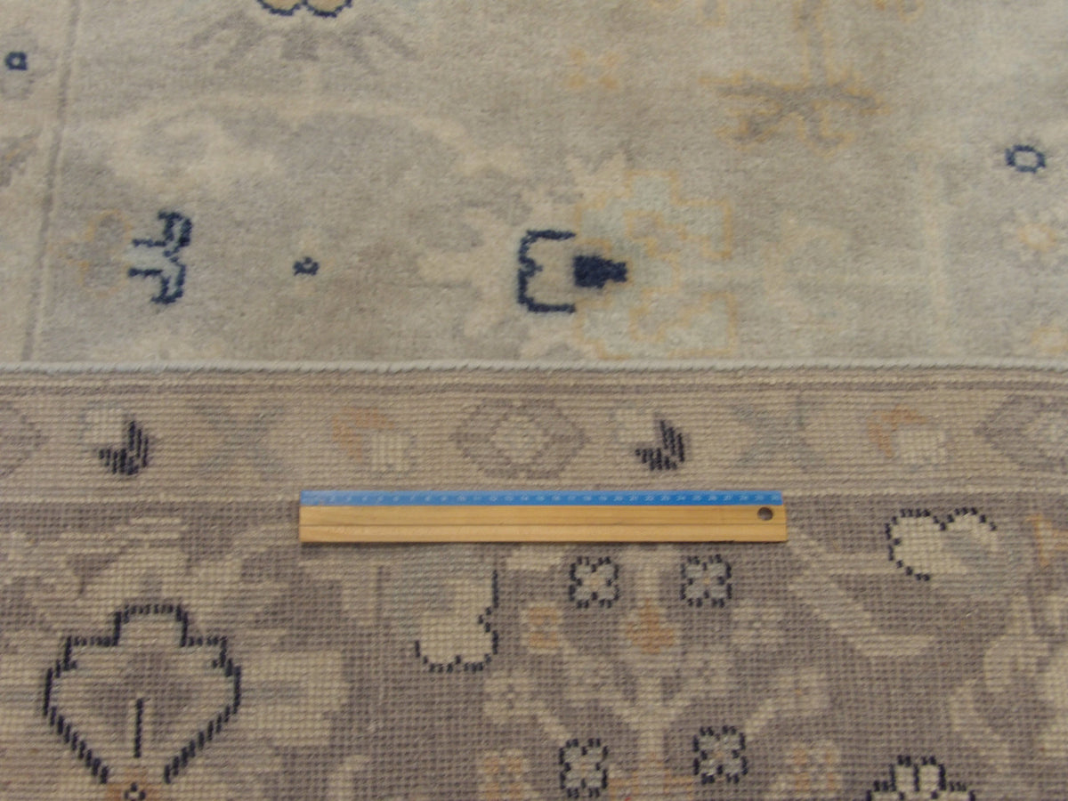 Gray Turk Oushak Vegetable Dye Wash rug in room setting