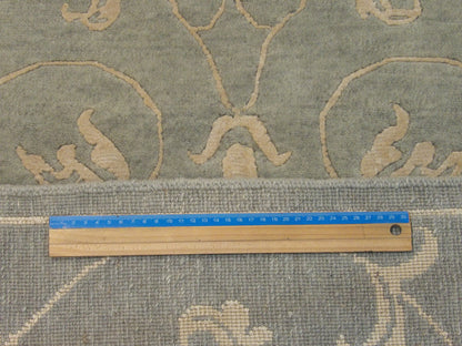 Full room view of transitional leaves hand-knotted rug