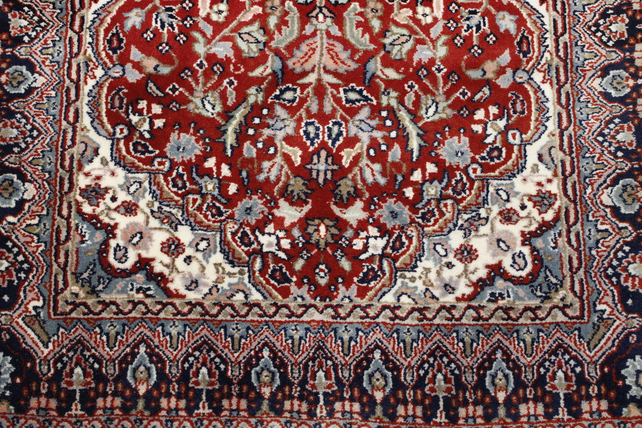 Traditional Fine Tabriz rug corner detail