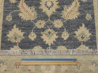 Gray & Beige Oushak Chobi Natural Dye rug in room setting