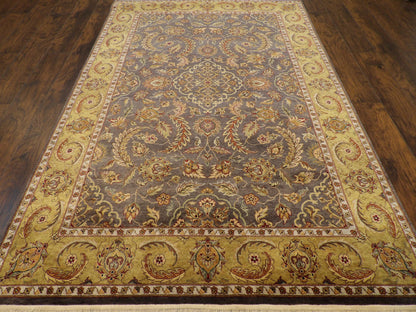 Close-up of wool pile, gold and purple rug