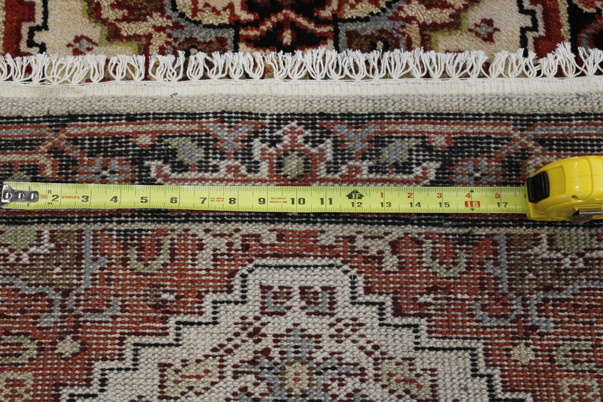 Back of Tribal Heriz hand-knotted rug