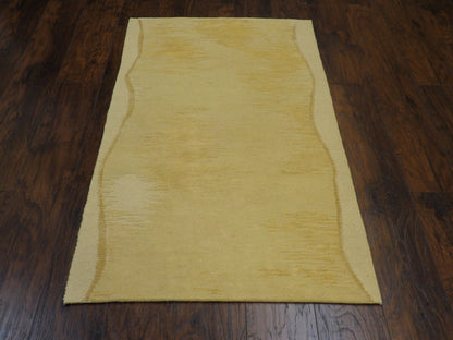 Close-up of wool-silk pile, gold rug