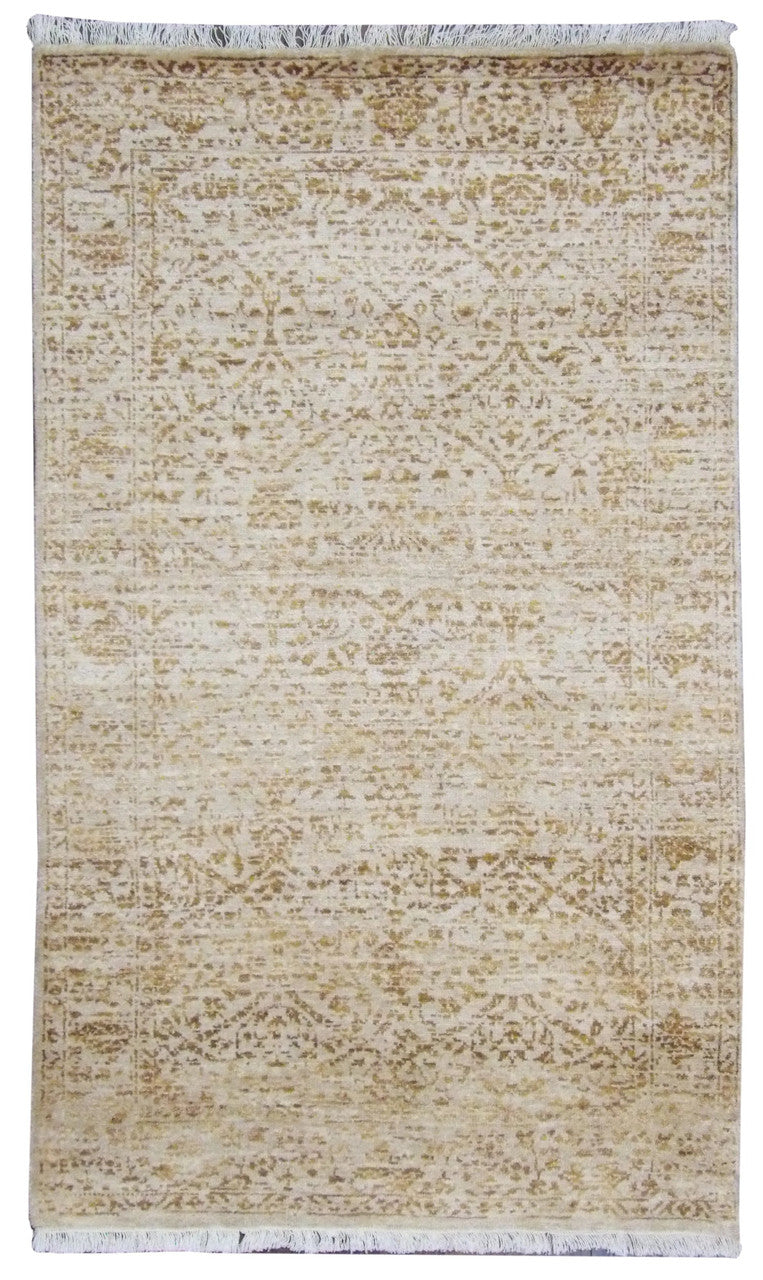 Modern broken design hand-knotted wool rug in gold, full view