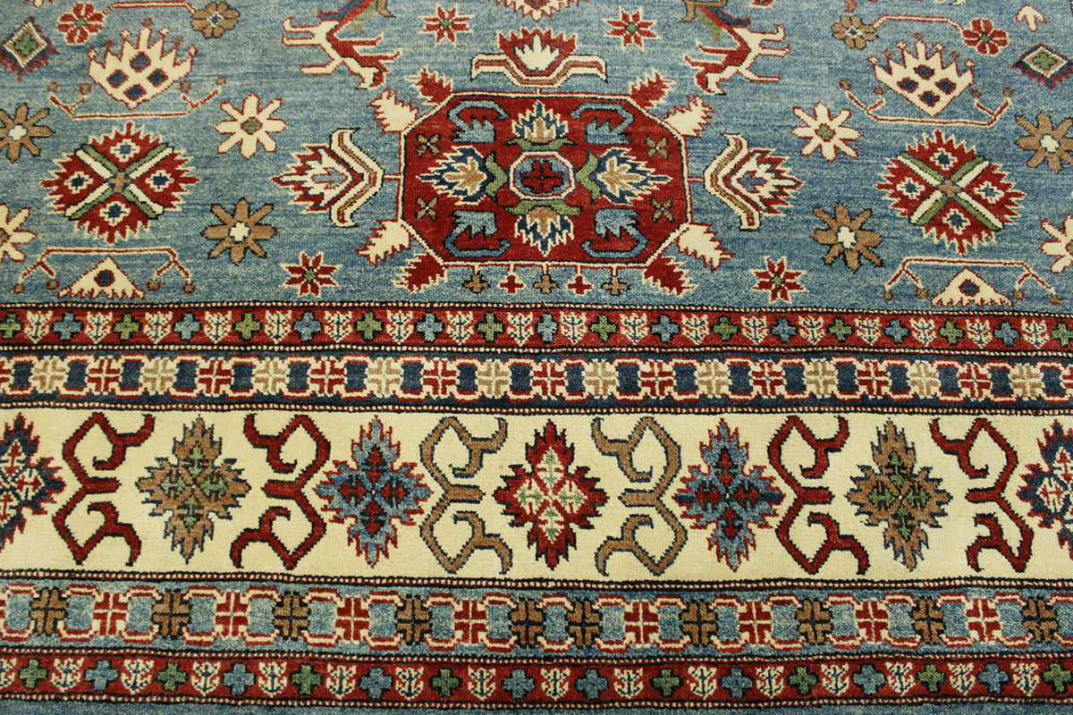 Tribal Super Kazak rug corner detail