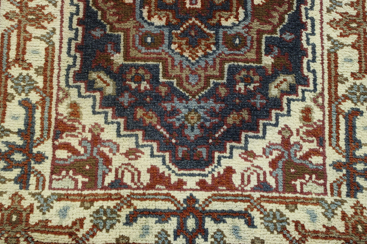 Tribal Heriz rug corner detail