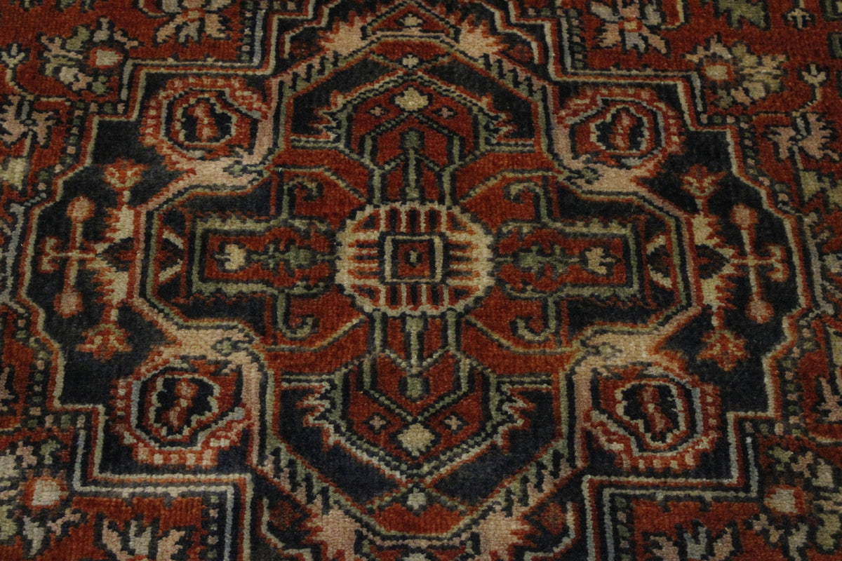 Tribal Heriz rug corner detail