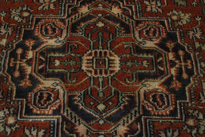 Tribal Heriz rug corner detail
