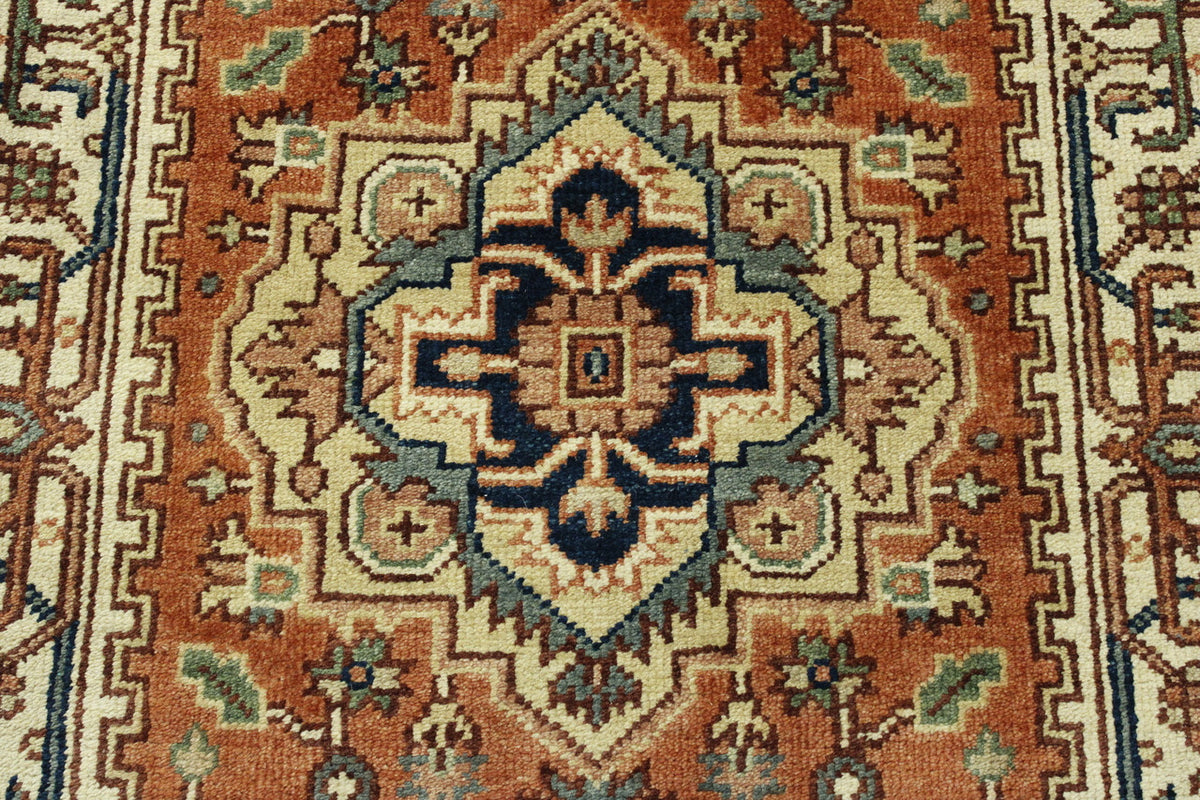 Beige & Rust Tribal Indo Heriz rug in room setting