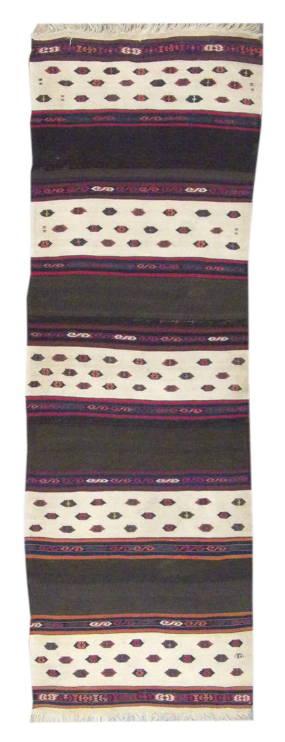 Antique tribal Turkish kilim hand-knotted wool runner in beige, brown, and rust, full view