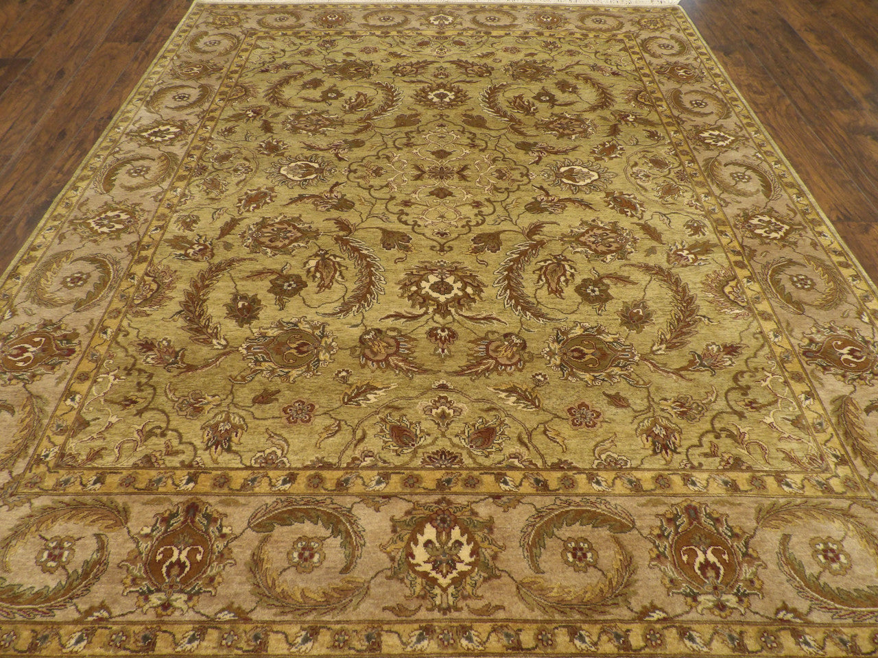Close-up of fine knotting on green Ziegler tie-dye rug