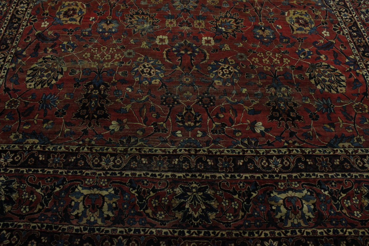 Traditional Antique Farahan rug corner detail