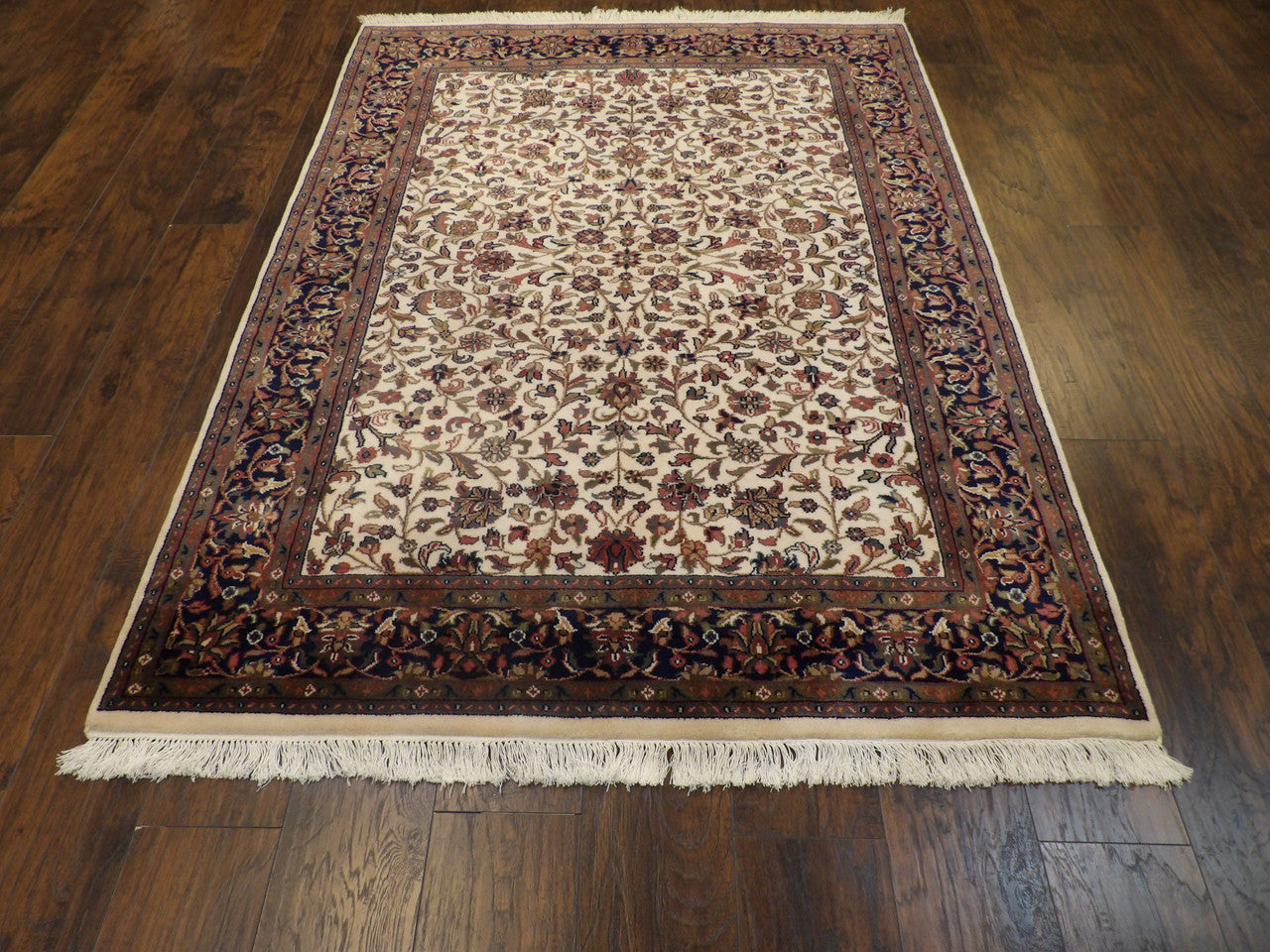 Back of hand-knotted Kashan rug showing construction