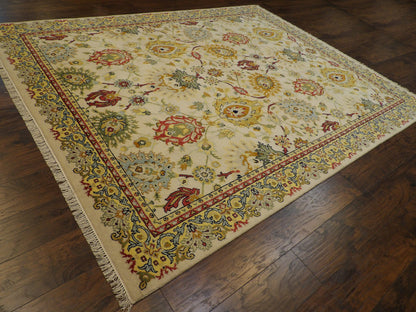 Ziegler pattern detail, gold and ivory colorful rug