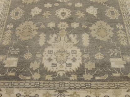 Back of Oushak hand-knotted rug