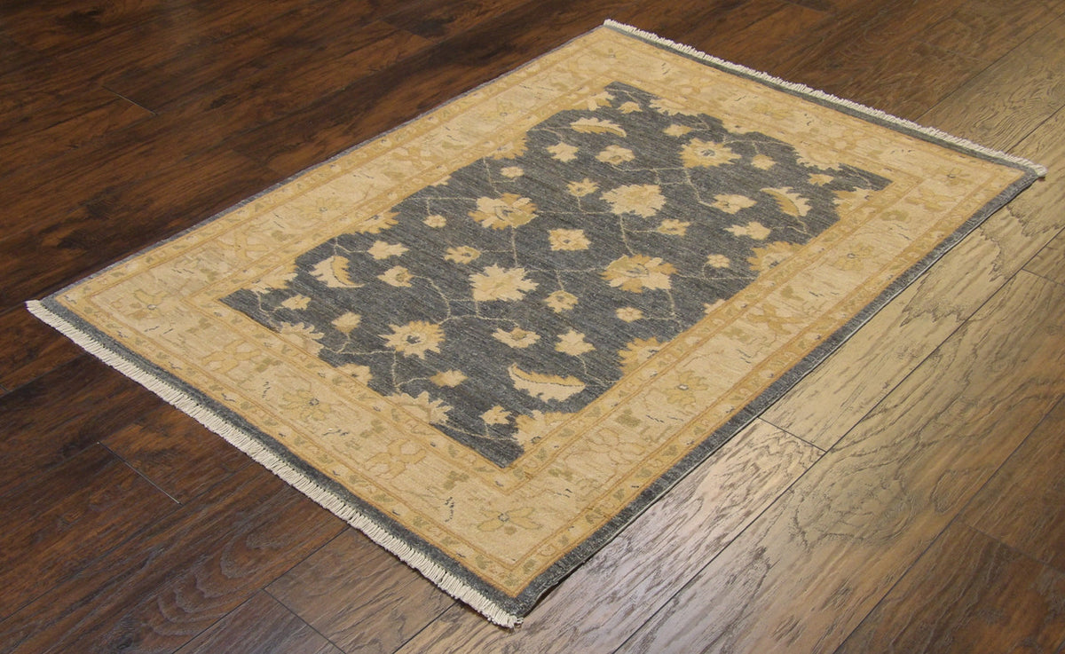 Close-up of wool pile, gray and ivory rug