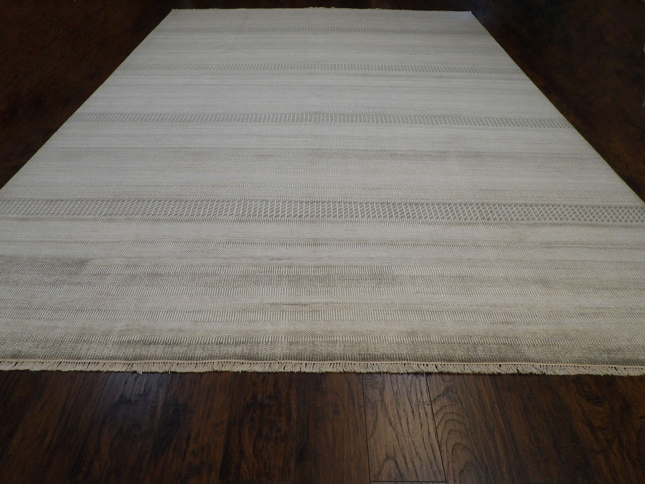 Close-up of wool-silk pile, Green & White rug