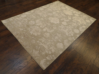 Floral pattern detail, carved beige rug