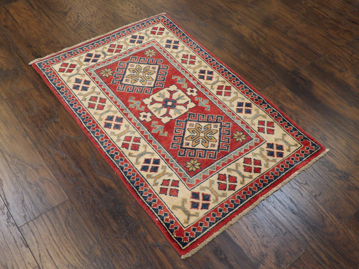 Full view of tribal Super Kazak rug