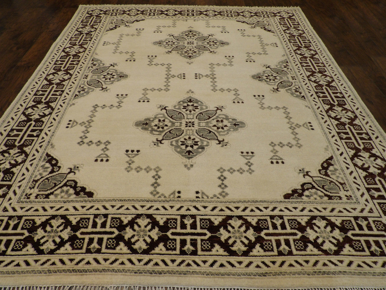 Back of hand-knotted Oushak Kazak rug showing construction
