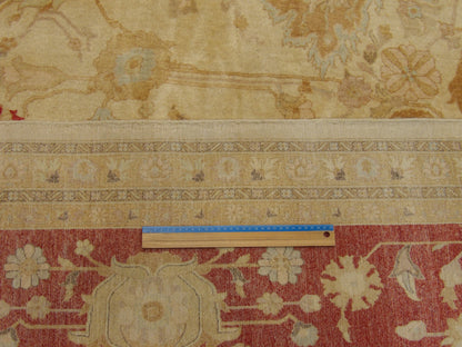 Beige and red Pak Persian rug in room setting