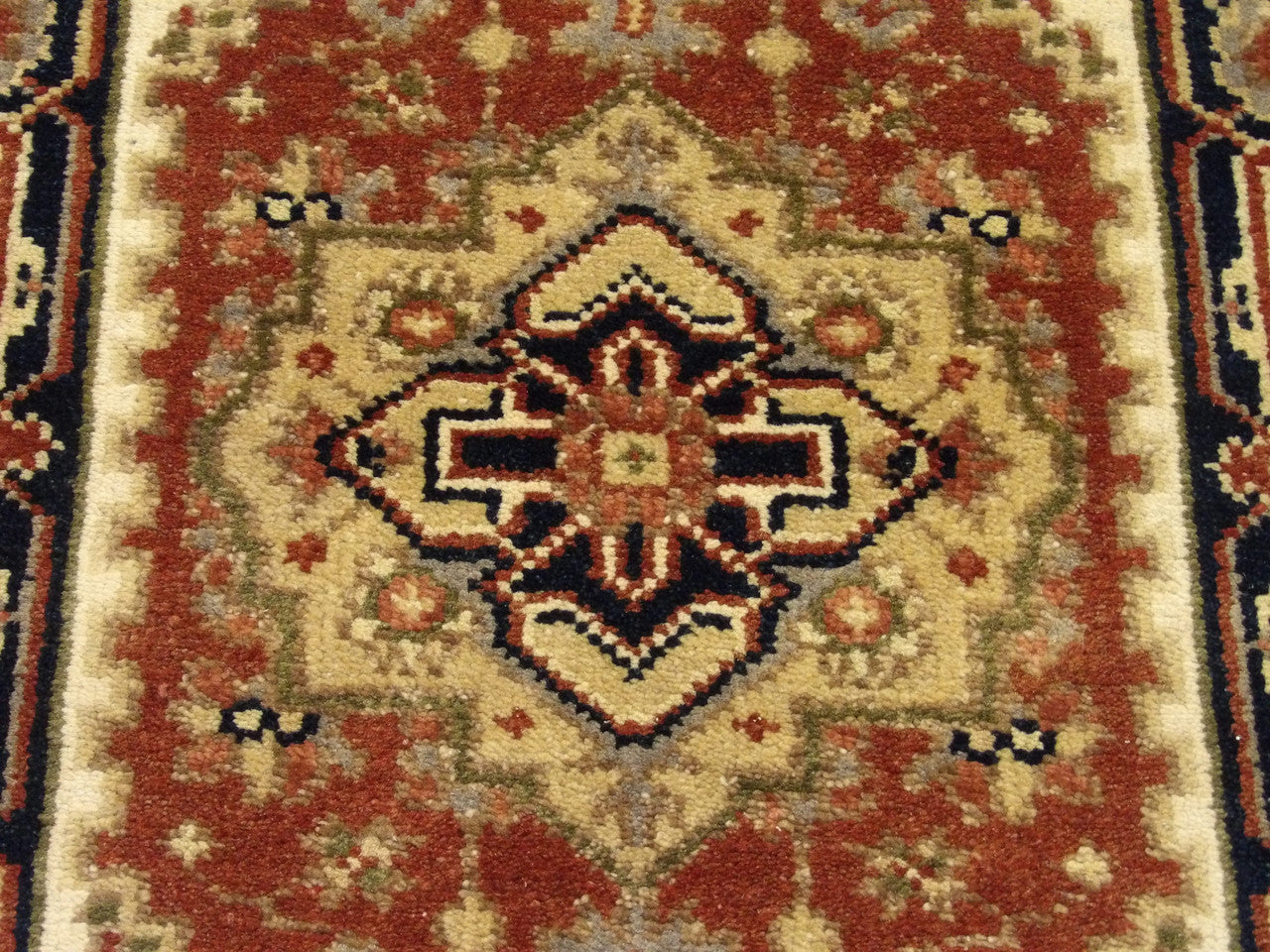 Back of Tribal Heriz hand-knotted rug