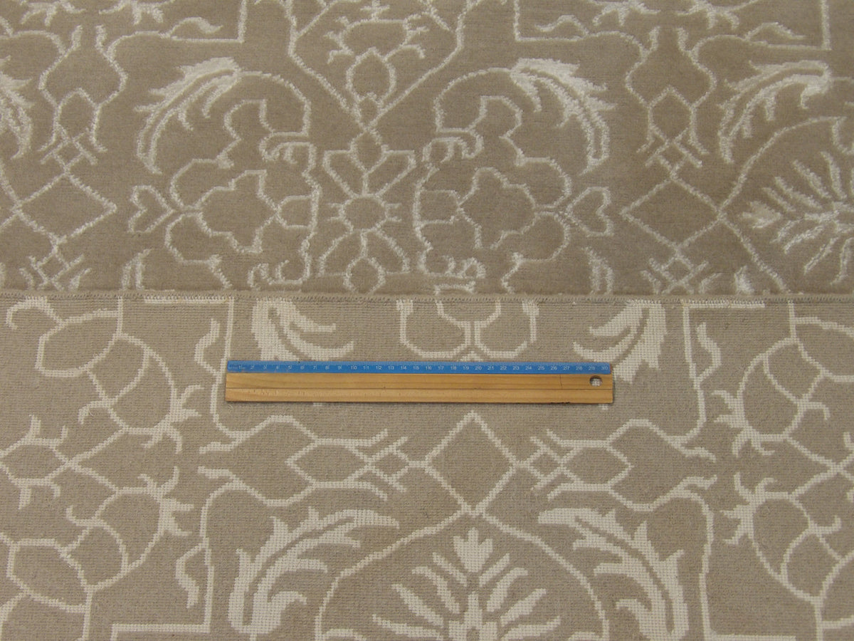 Wool-silk texture close-up, gray and beige broken design