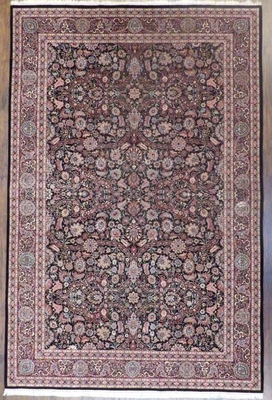 Fine Sino-Persian Kashan hand-knotted wool-silk rug in black and red, full view