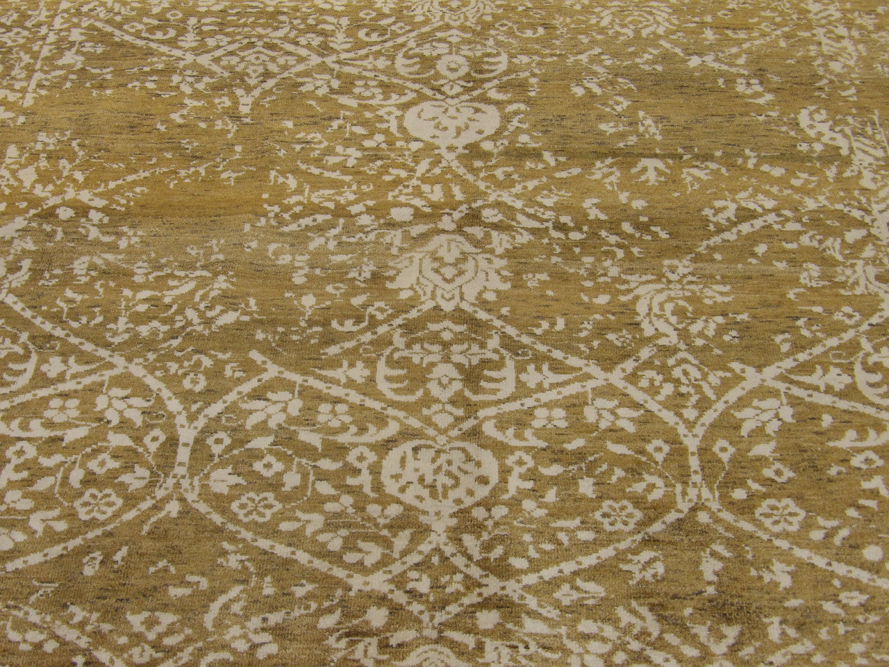 Wool-silk texture close-up, beige and ivory damask rug