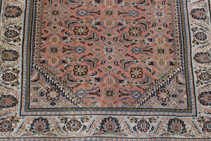 Traditional Fine Mashad rug corner detail