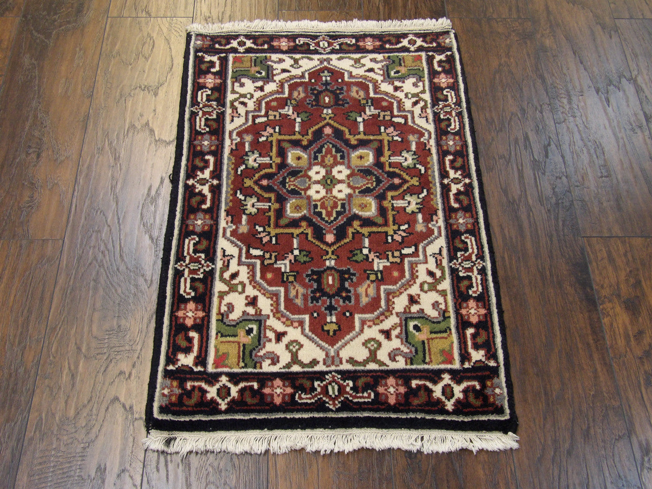 Tribal Heriz rug corner detail