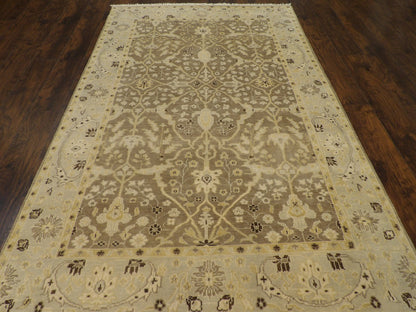 Close-up of wool pile, brown and gold rug