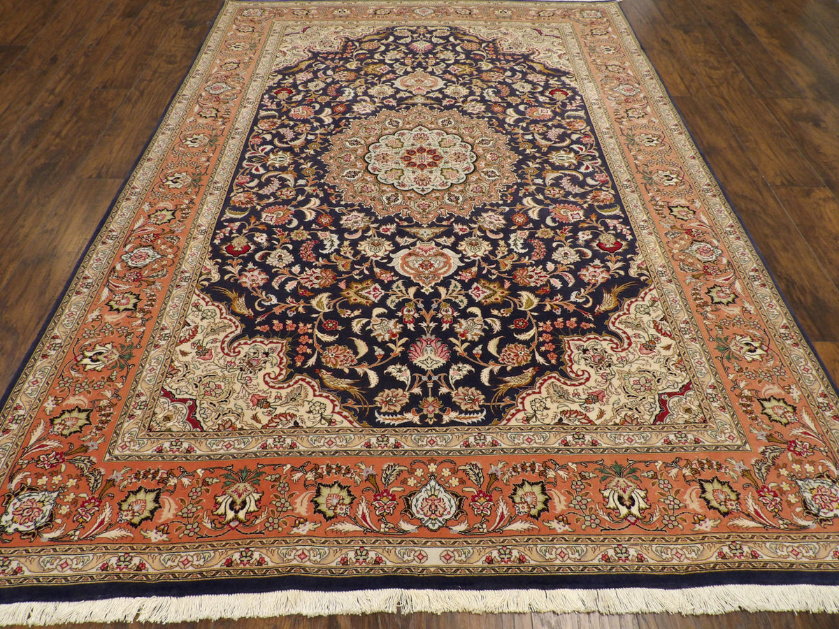 Close-up of wool-silk pile, blue and pink rug