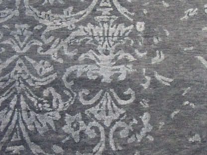 Transitional Broken Damask rug border detail
