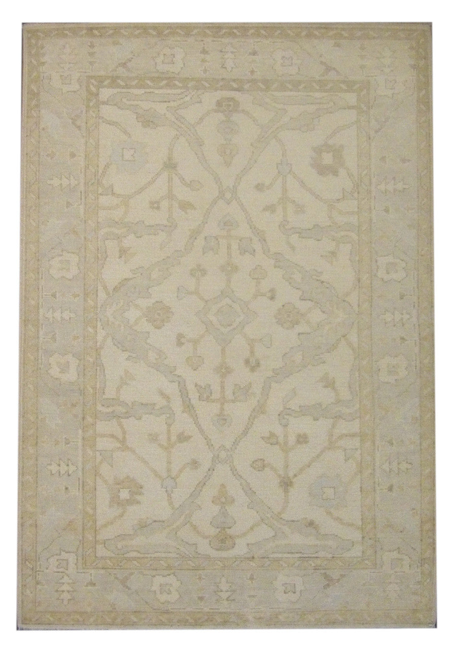 Anatolian Oushak hand-knotted wool rug in blue and ivory, full view