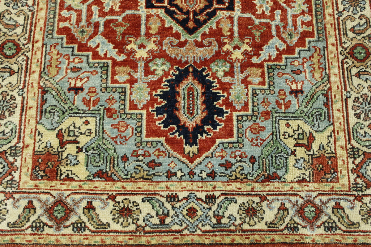 Beige & Rust Tribal Heriz rug in room setting